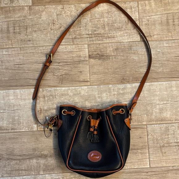 Dooney & Bourke Handbags - Dooney & Bourke Vintage All-Weather Leather Blue Drawstring Bucket Bag